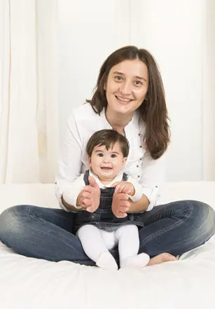 Mother,And,Daughter,Playing,On,Bed,Isolated,On,White,Background